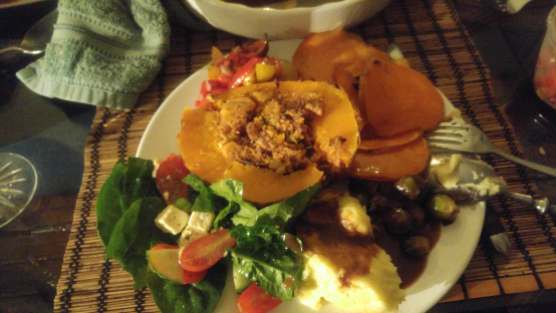 Roasted squash with stuffing, mashed potatoes, sweet potatoe pie, greek salad, and more. Not the most traditional Thanksgiving dinner but one of the most special Thanksgivings I've ever had!